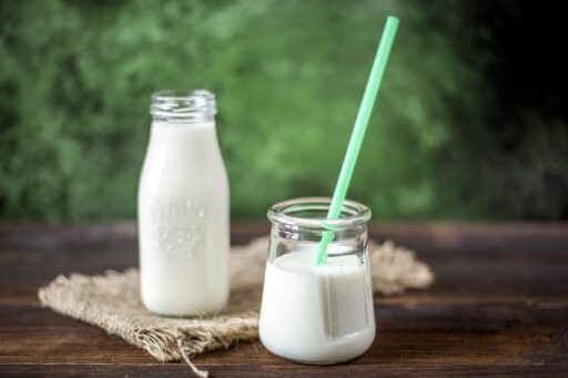 Milk in glass and milk in a jug